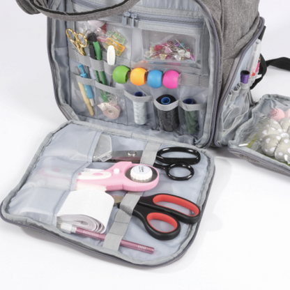 The Premium Quilting Organizer Backpack, crafted from durable 600D Oxford fabric, opens to reveal organized compartments stocked with sewing and quilting tools such as scissors, thread spools, measuring tape, pins, and more.