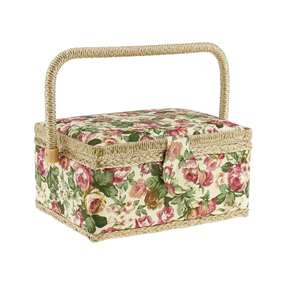 The Extra Large Vintage Sewing Basket boasts a rectangular wicker design with a pink and green floral fabric cover, capturing vintage aesthetics. It features a woven handle and front clasp.